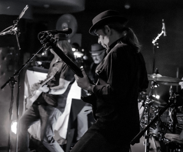 Black and white image of band performing
